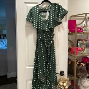 The perfect holiday dress! Mid length, flutter sleeve dress